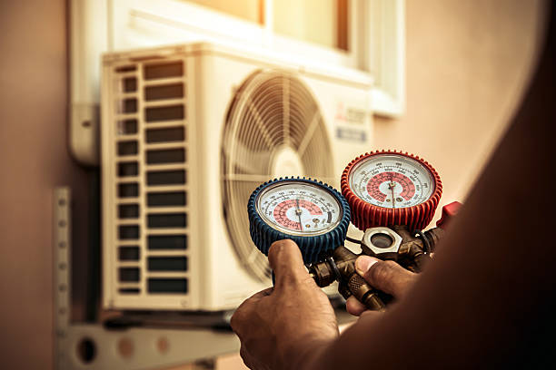 Professional Hvac technician working in Normal, AL